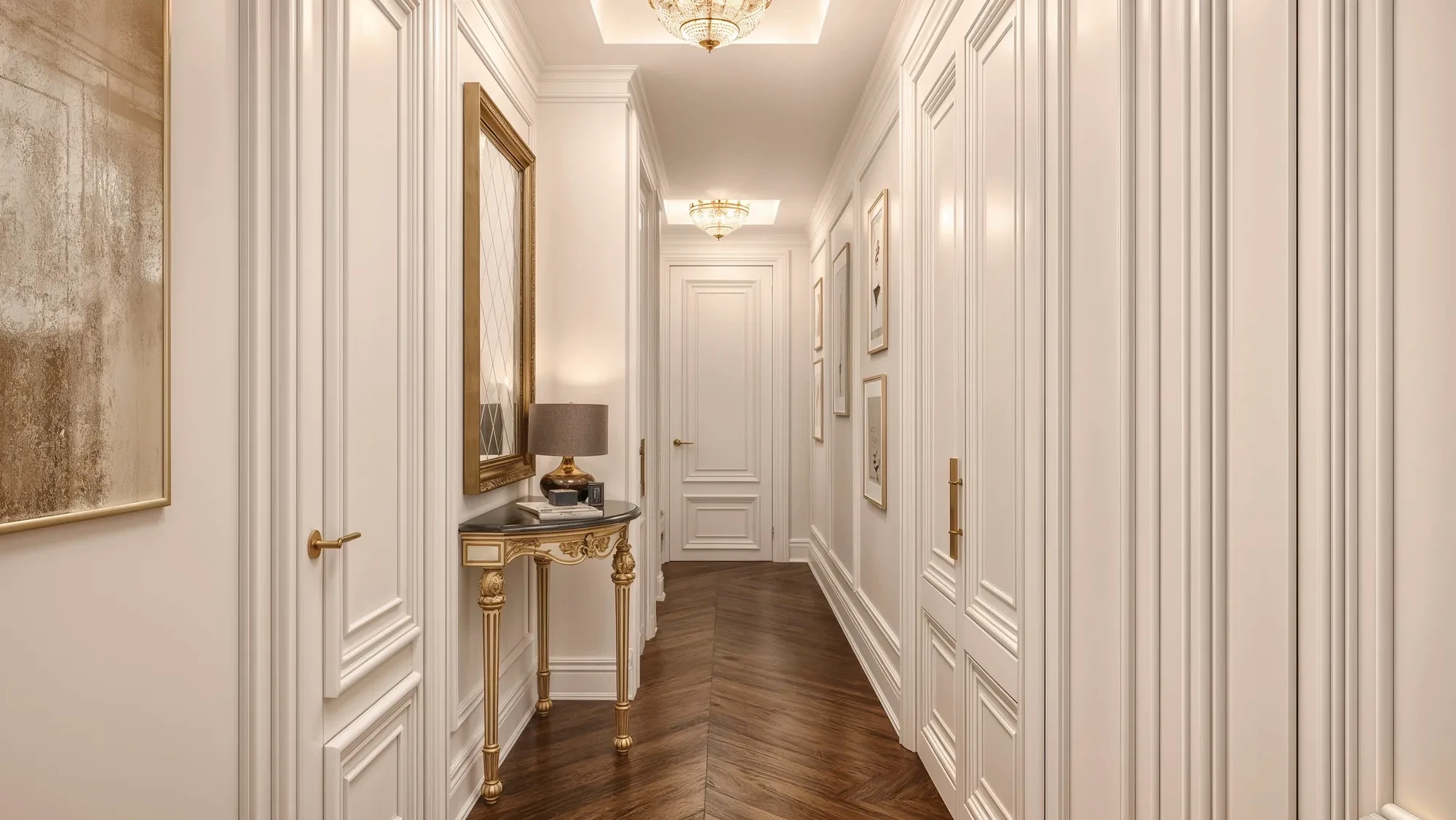 Paneled entry hall with herringbone floors